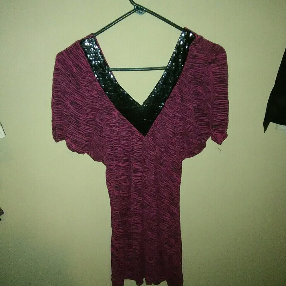 Black and pink zebra print shirt.